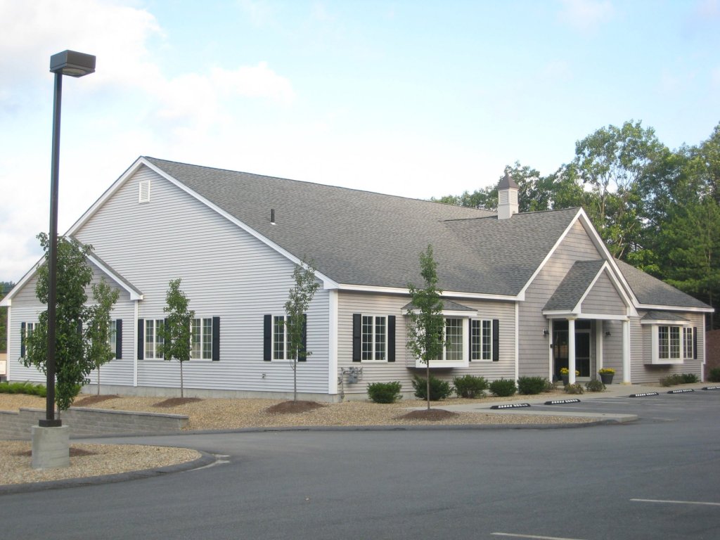 Exterior view of the dental office building with patient parking and main entrance